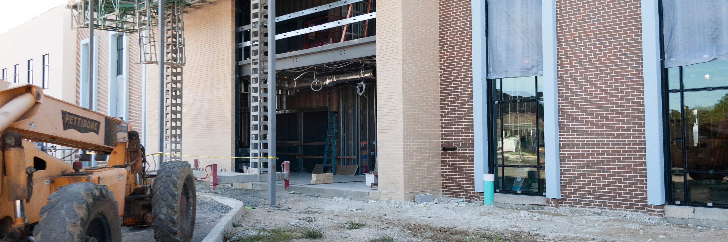 Scene of a house being built.